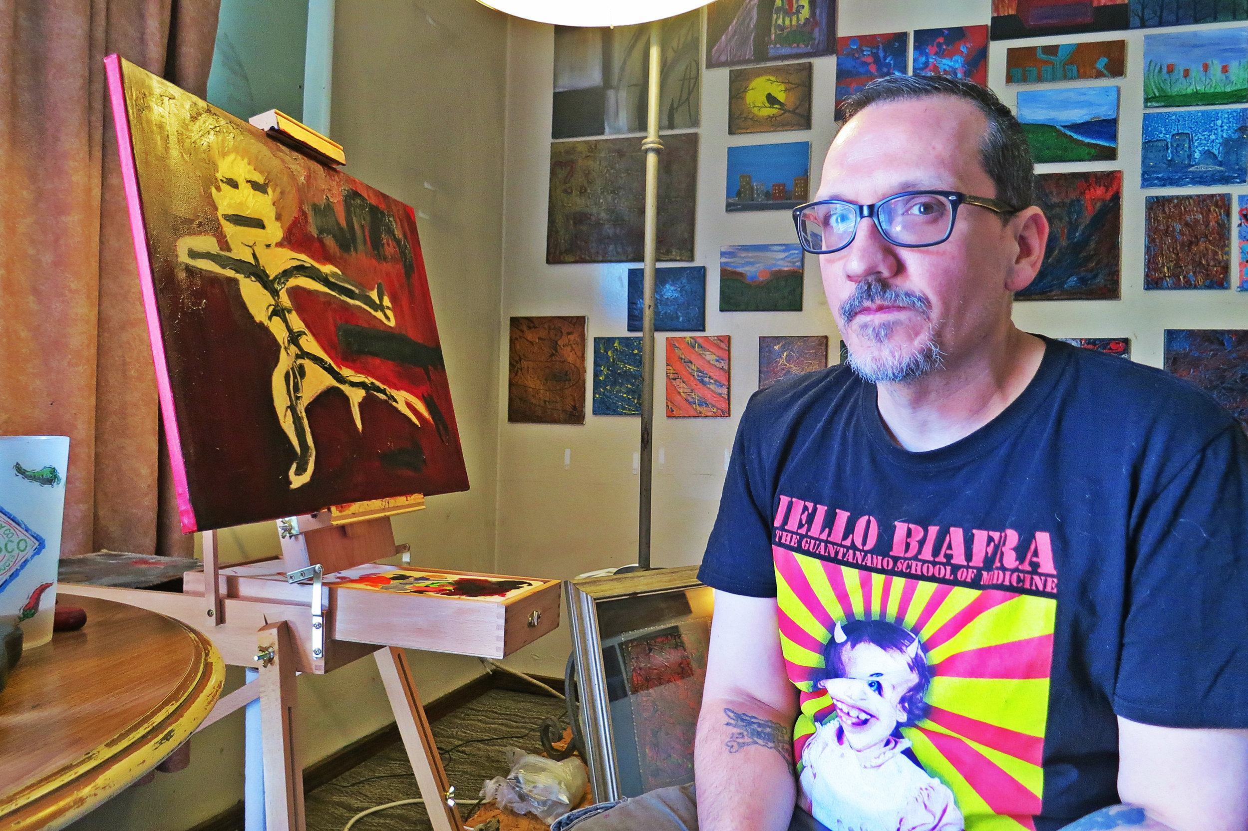 Chad poses in front of a work in progress painting possibly called “My Shadow”. “My paintings just come out and end up looking like they do," he said during a recent visit. This photo was taken during Nada Dada 2016.