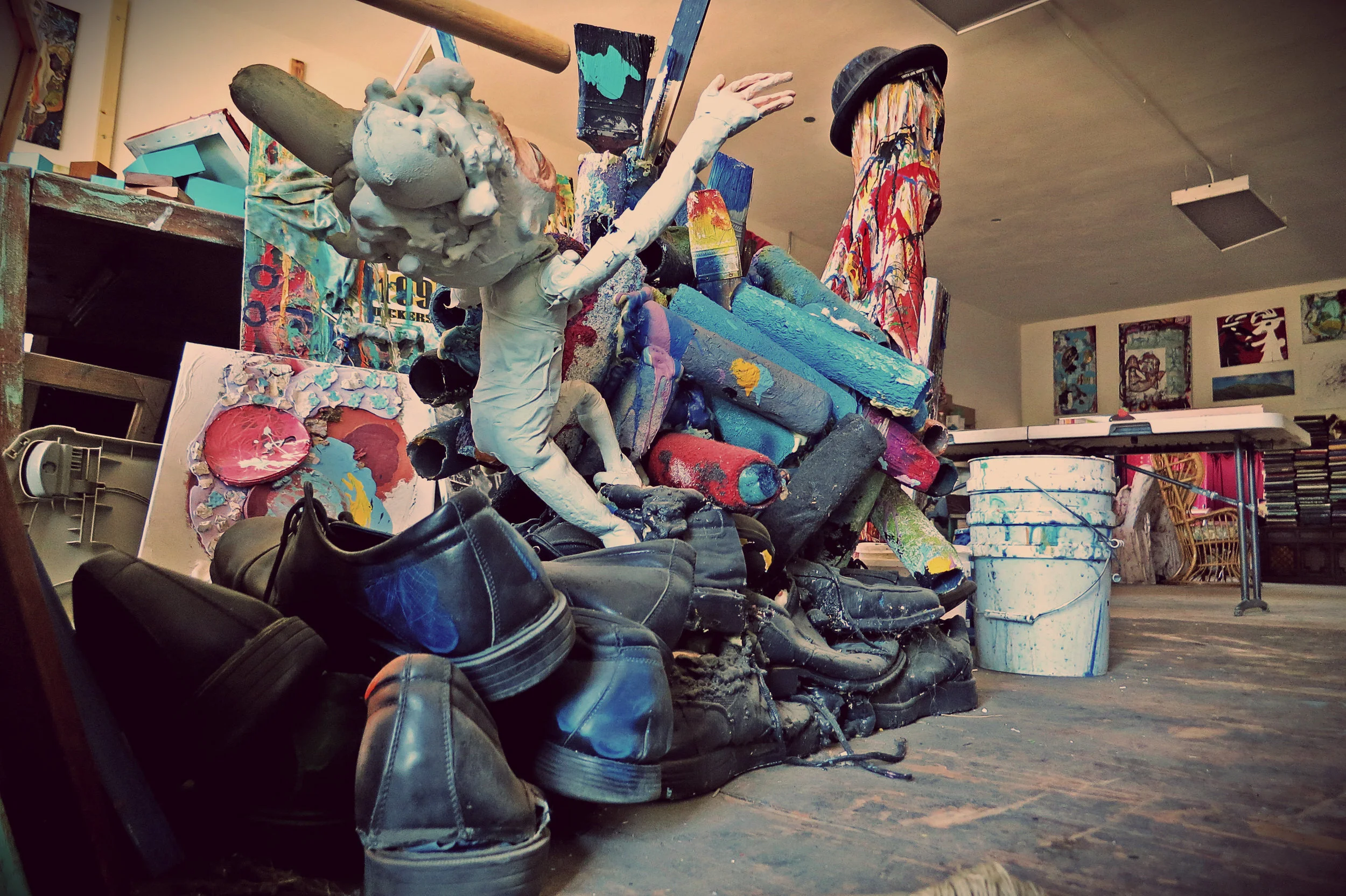 “This one is called Golden Carrot. It’s made of all of my work shoes for five years and rollers for the murals I did for three years. I purposefully bought the same cheap style of shoe knowing I was going to turn them into this.” 