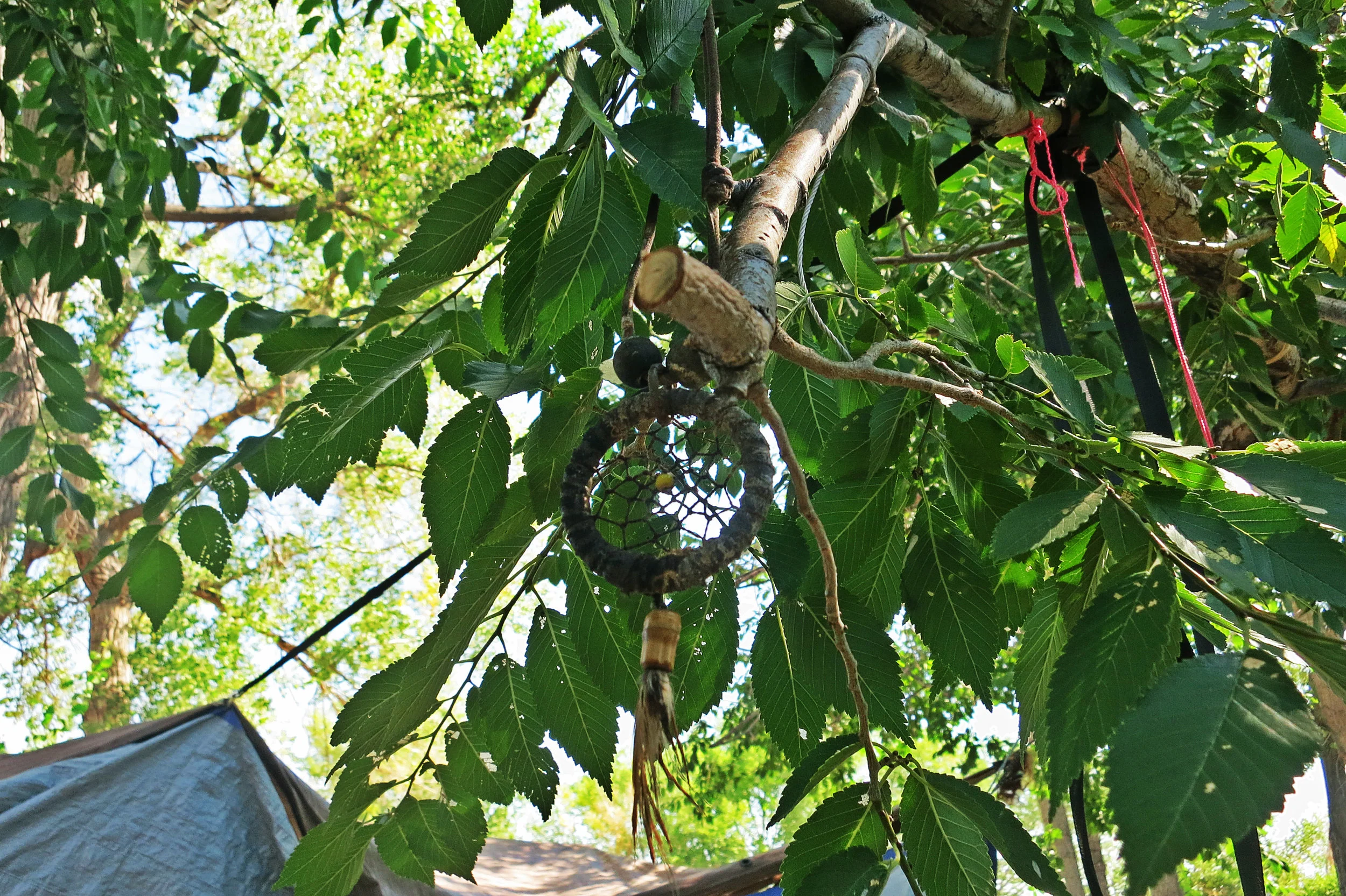 Outside her tent, a dream catcher. "Everybody has bad dreams. This will catch them." 