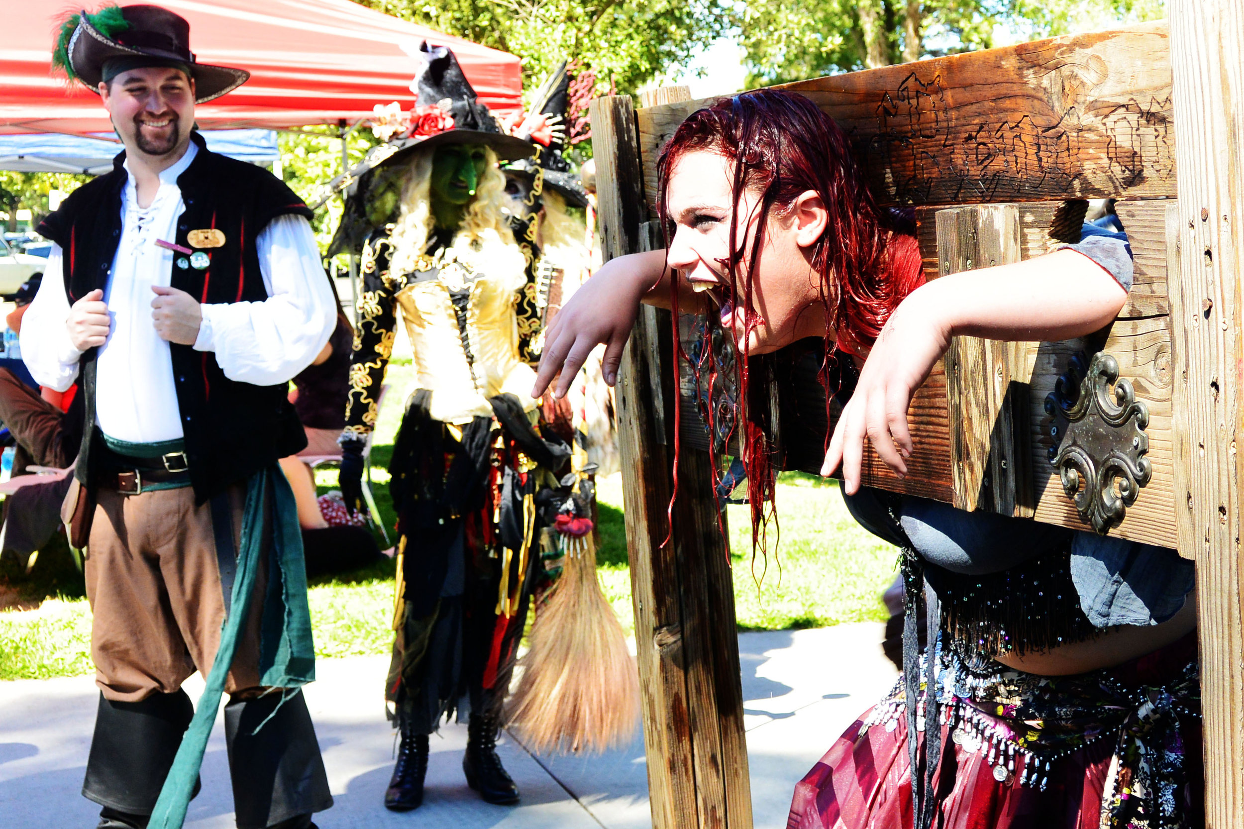 Flogging, water torture, accepting bribes to issue warrants, drenched survivors told to "go forth and sin some more," and auctions for We Care Volunteers were part of the festivities as pirates and witches invaded Idlewild Park.