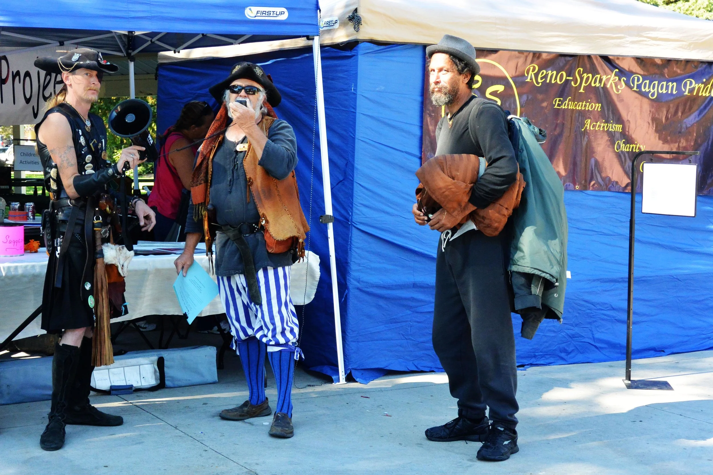 George (right), a father of four and grandfather of one, now living on the streets, recognized the Pirates of Reno from their weekly feeding.