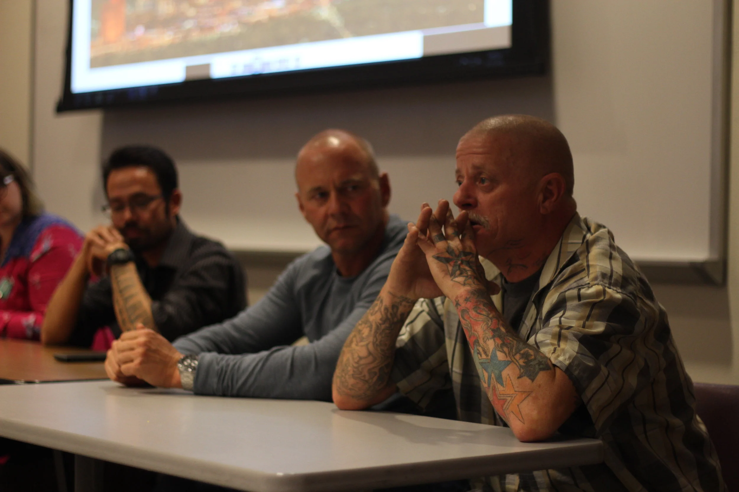 Larry (right), who lives in a weekly motel, took part in a panel on homelessness last week in Reno. Photo by Jose Olivares for Our Town Reno
