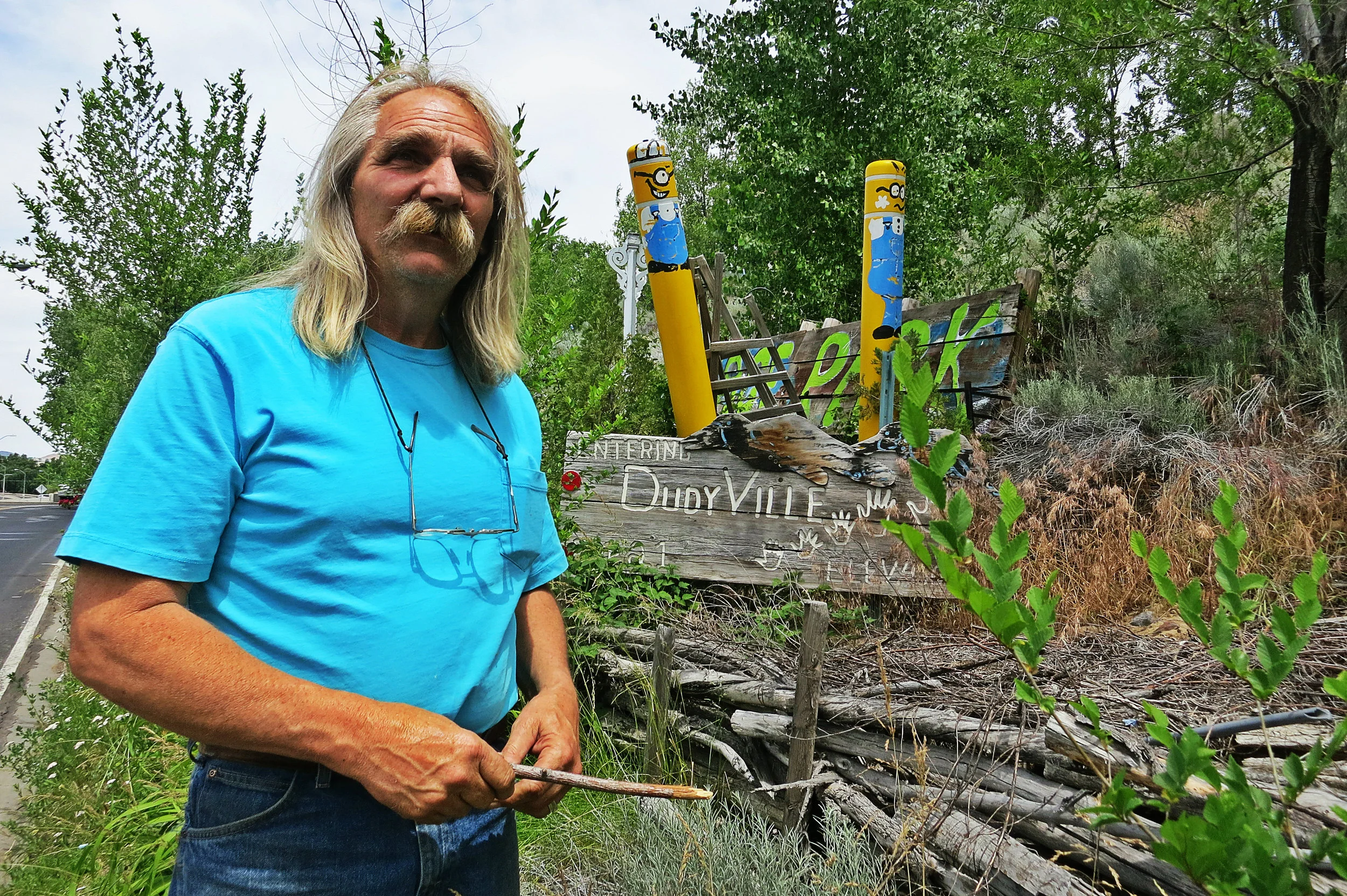 Dudyville (derived from his son’s nickname) is reflective of Demian Trevor O’Keeffe, a Colorado rancher’s son, an ‘old 1960s hippie’, a retired civil engineer who sold a lucrative patent and bought a marina, a one time harbormaster in San Pablo Bay, a world traveller, a former activist in Reno’s Occupy movement, a welder and gardener, a father and the husband of artist Shannon O’Keeffe, to name just a few of his highlights.