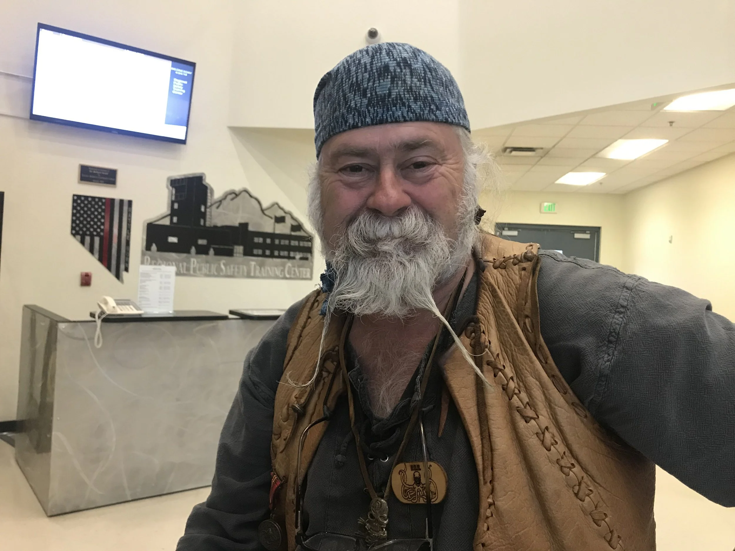 One volunteer, who attended the meeting, Ron Nobles, known as Commodore Kraken, has been handing out meals for eight years with the Pirates of Reno group on Thursday evenings at the Record street shelter compound. Nobles is skeptical of the need for change saying he’s only seen five fights during his time at the volunteer feedings he’s helped with. Photo by Lucia Starbuck