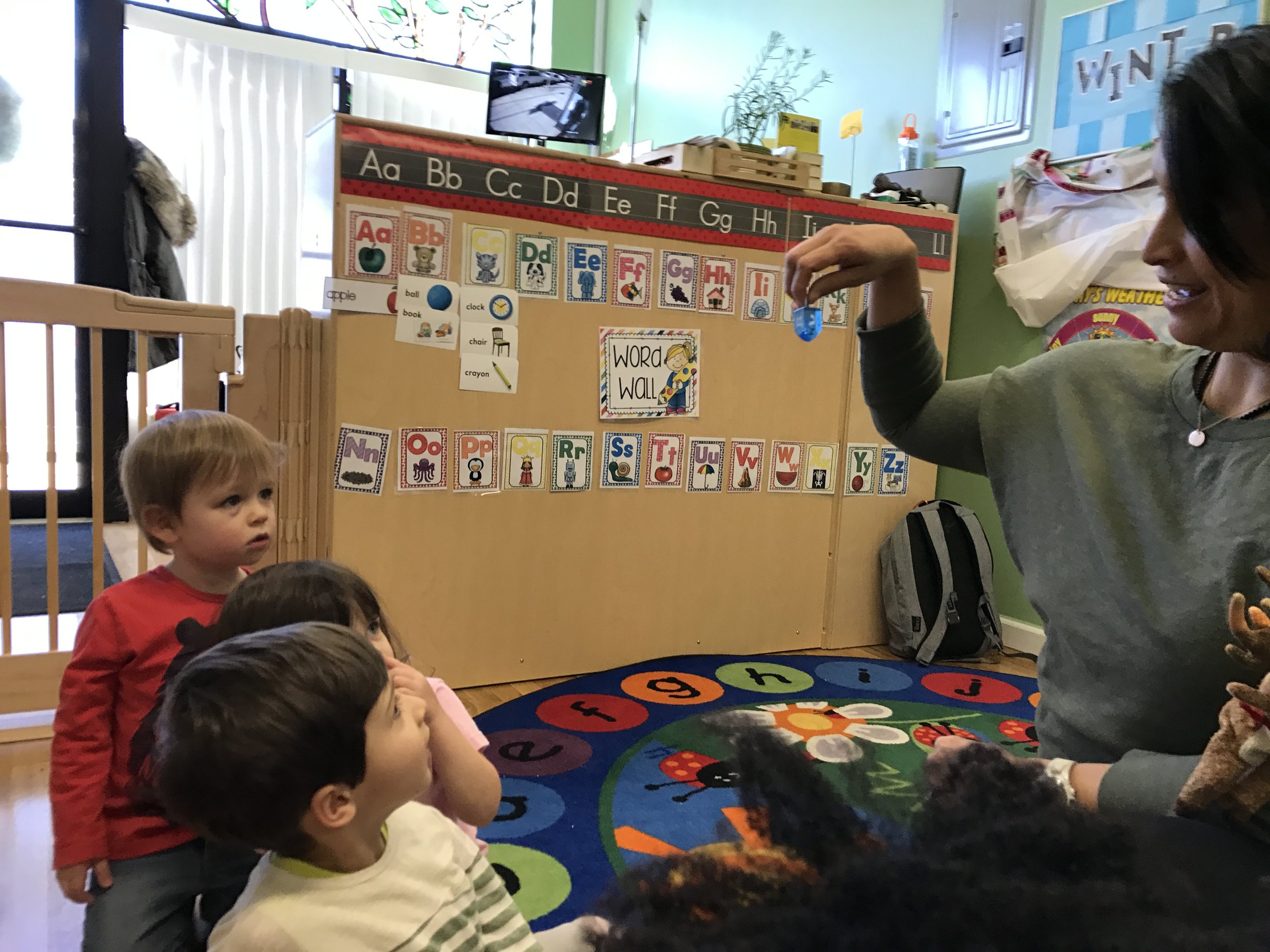  Teacher April brought a dreidel along!