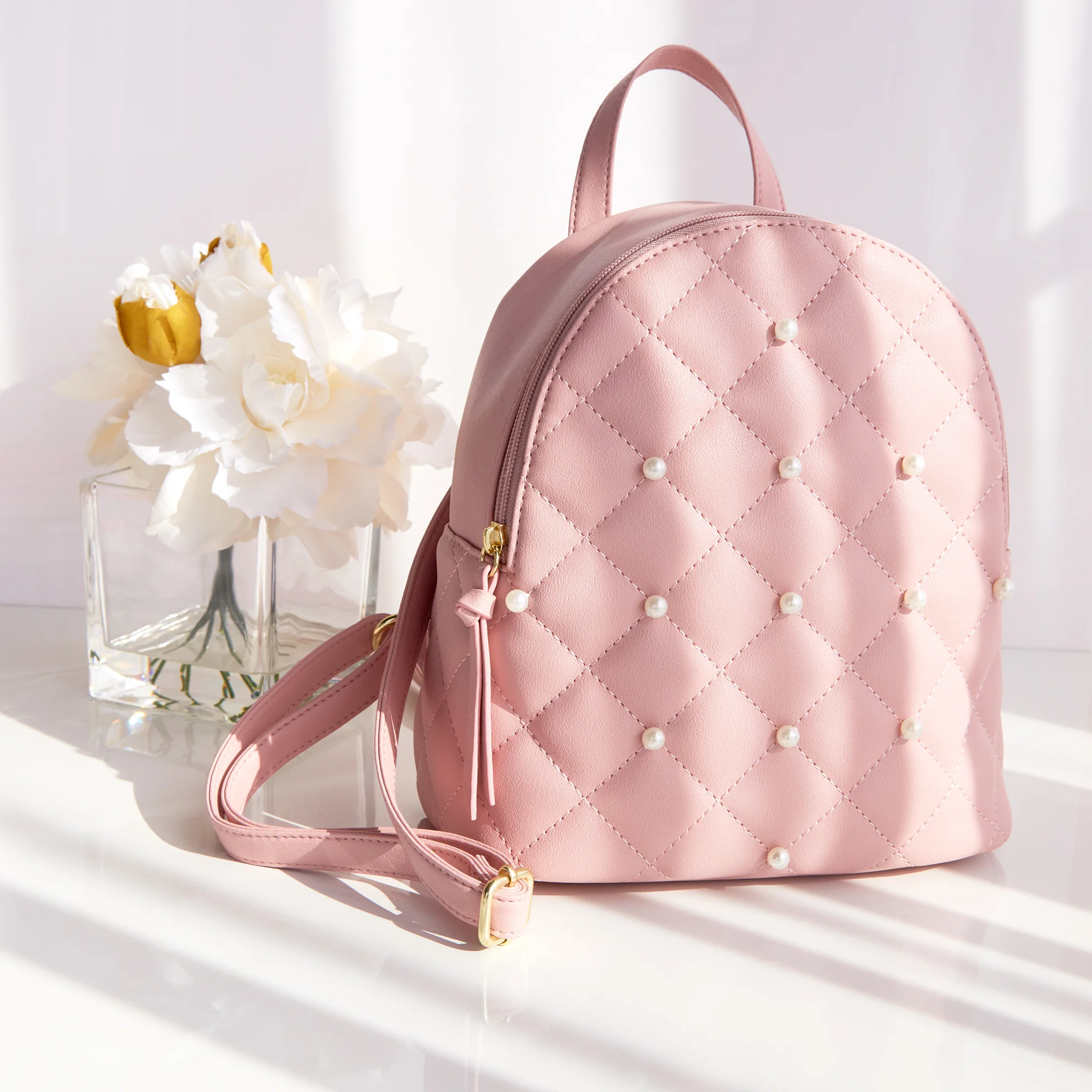 2018_IC_WK06_Blush Pearl Backpack.jpg
