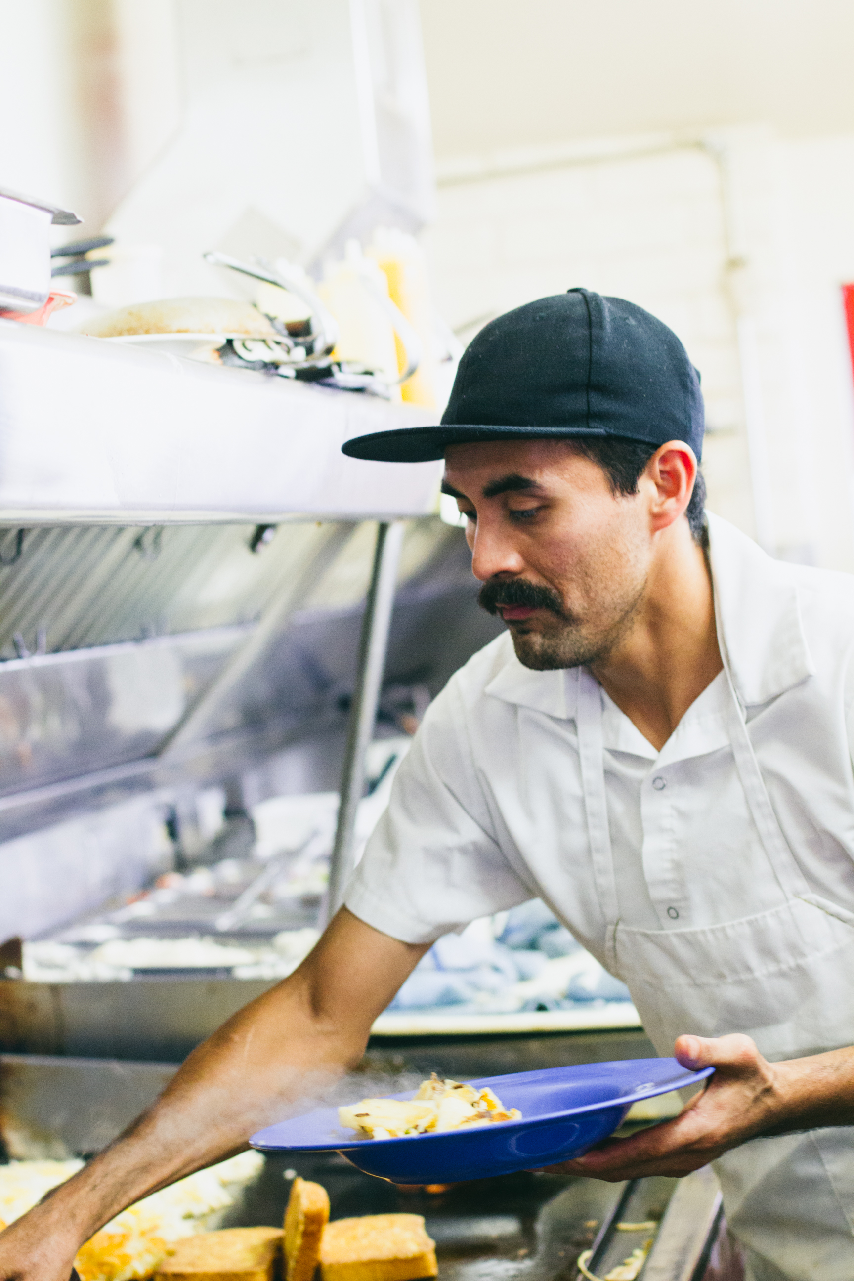 Chef prepares food in the kitchen