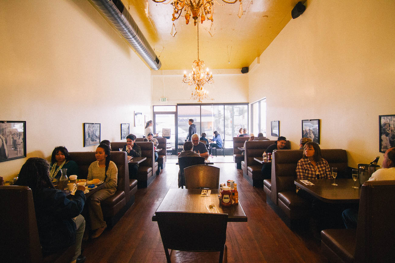 Interior scene Ventura Restaurant with customers seated.