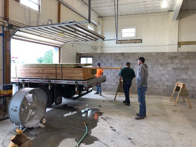 Delivery of lumber in the Training Room