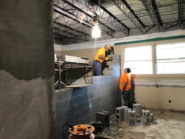 Wall between respite care and the laundry room