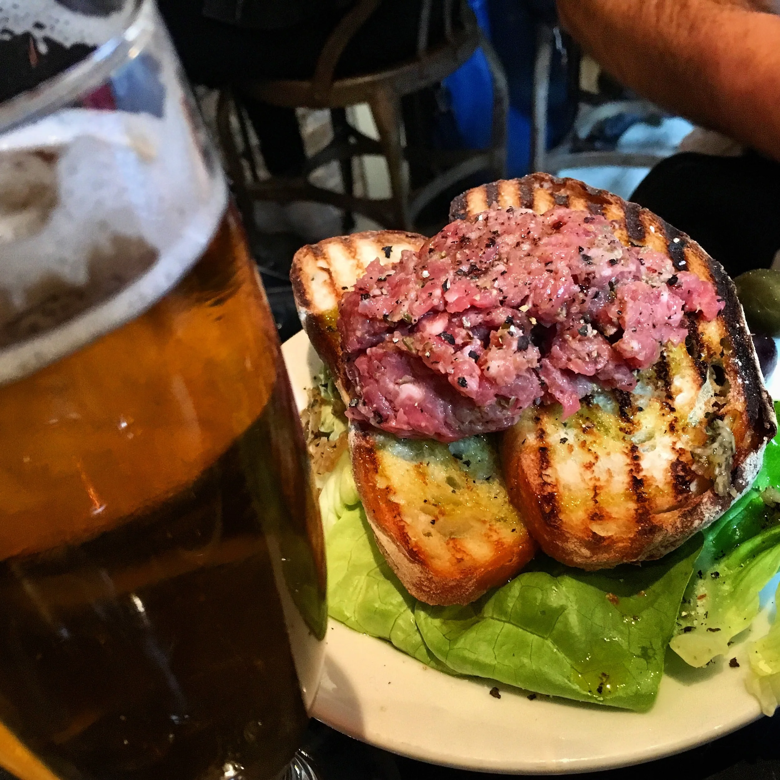 Steak tartare went perfectly with a French lager beer. The raw steak, dusted with freshly cracked black pepper, was on grilled bread on top of a bed of Boston lettuce tossed with a flavorful vinaigrette.