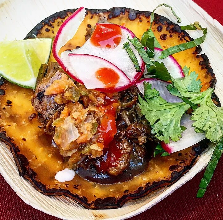 Marc Forgione 's lamb barbacoa, guajillo and black garlic tortilla