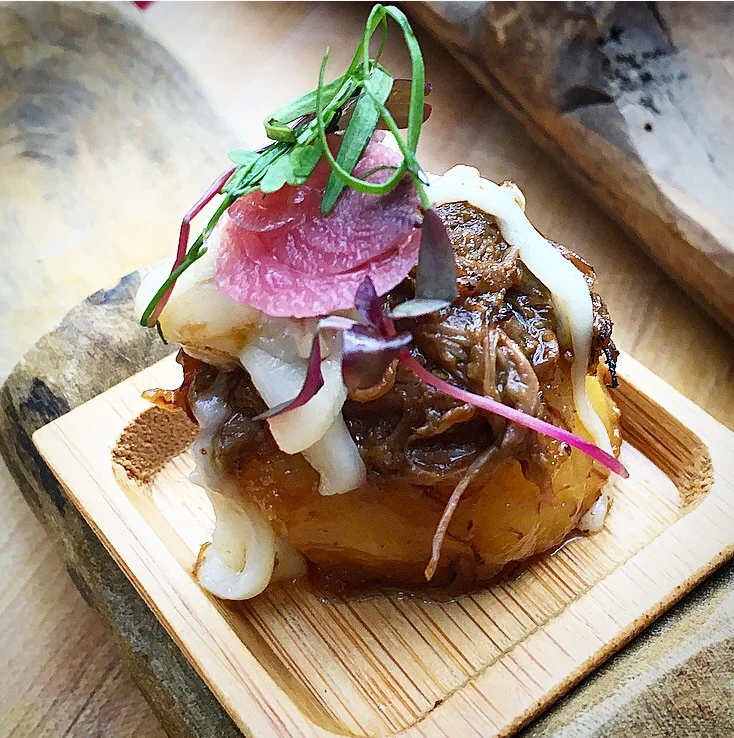 Canoas with smoked brisket, pickled shallots and torched mozzarella from Spice It Up in Aspen, Colorado