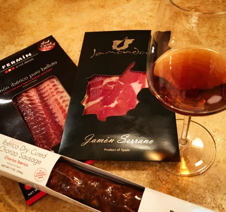 Getting ready to have some cured meats with an Oloroso Sherry. the dark color of the wine comes from oxidative aging in barrels.