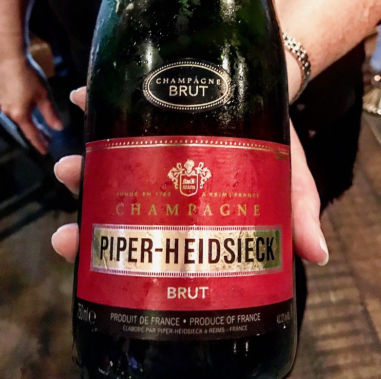 The Piper-Heidsieck Cuvee Brut found at your local wine shop will have this red label and should cost about $36