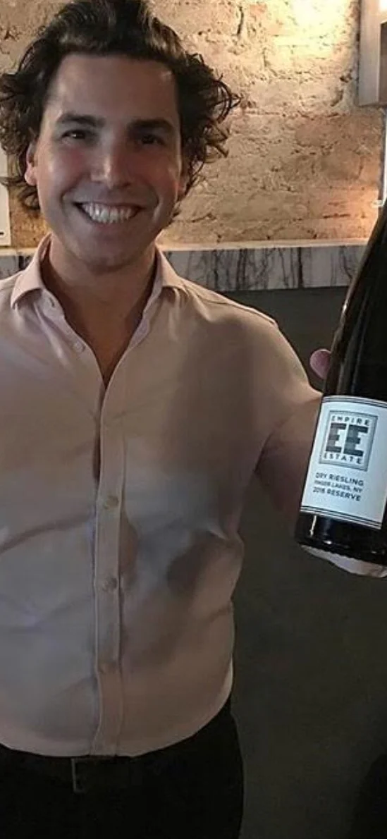 Thomas, with his 2016 Empire Estate Dry Riesling. Photo: Lisa Denning