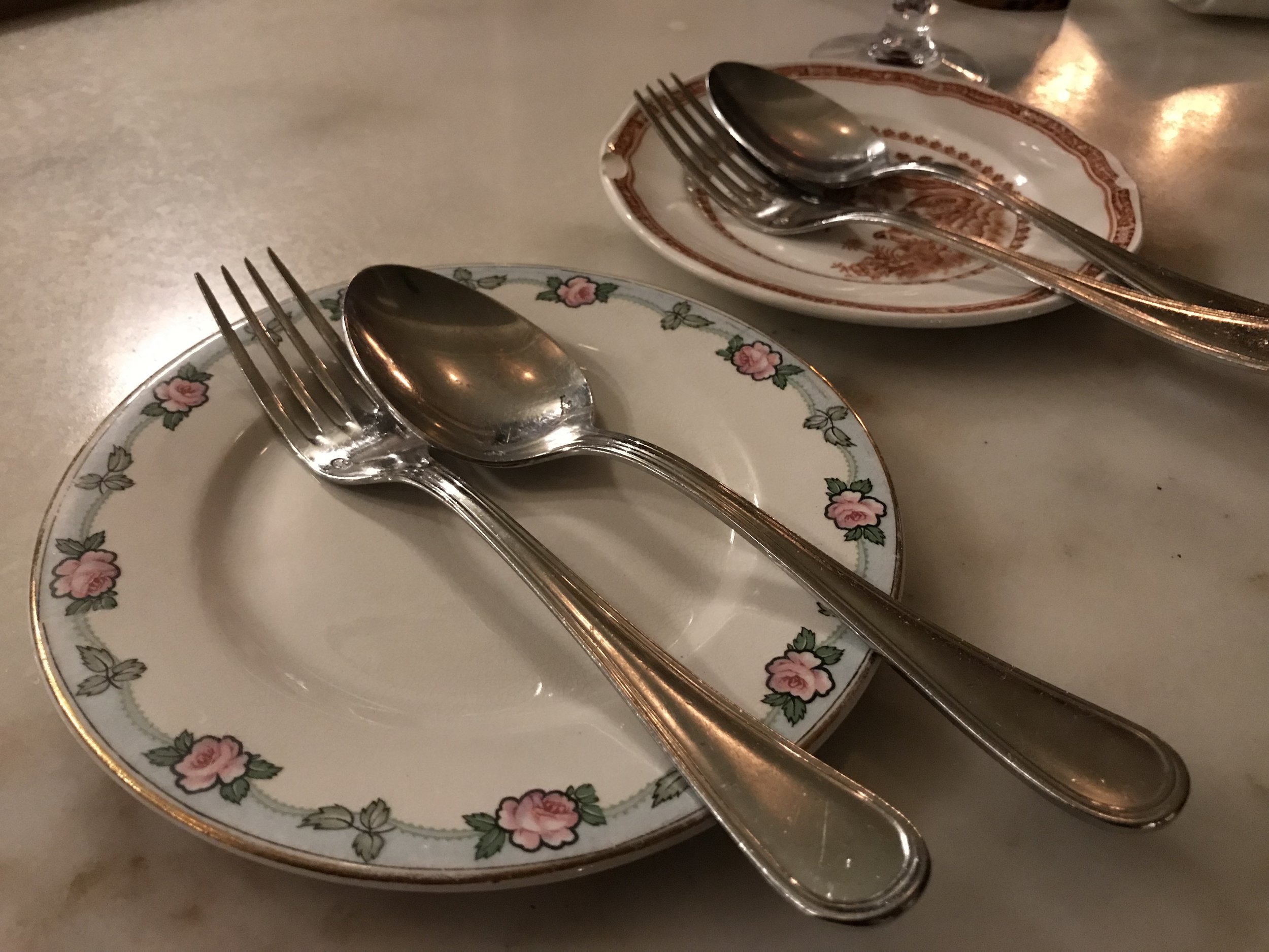 Via Carota’s Charming, vintage place settings.