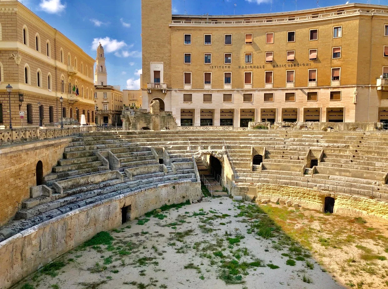 Below the ground level of Lecce, the well-conserved 2nd Century A.D. Roman amphitheater is still used for performances.