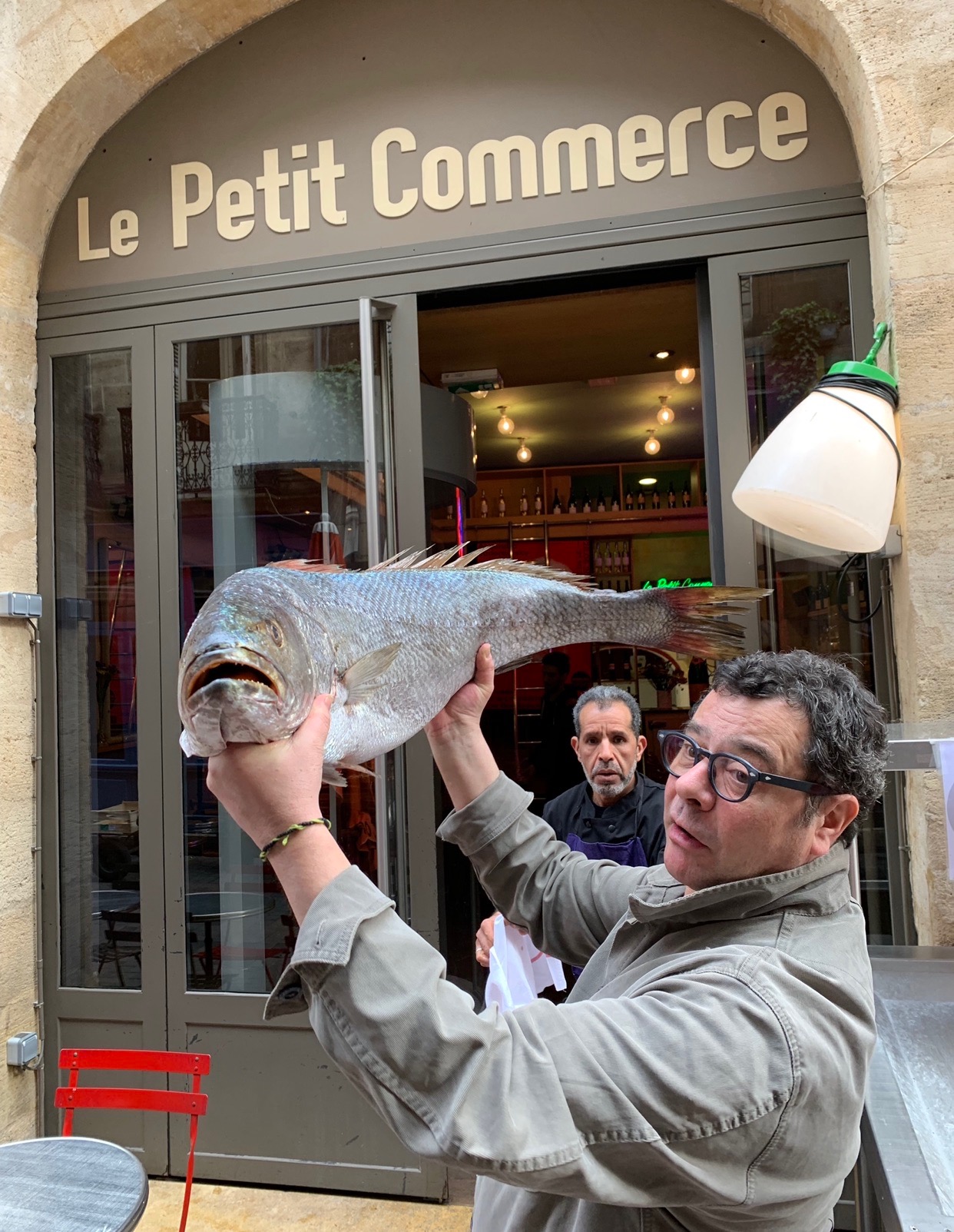 Outside Le Petit Commerce with the owner and his fresh catch of the day!