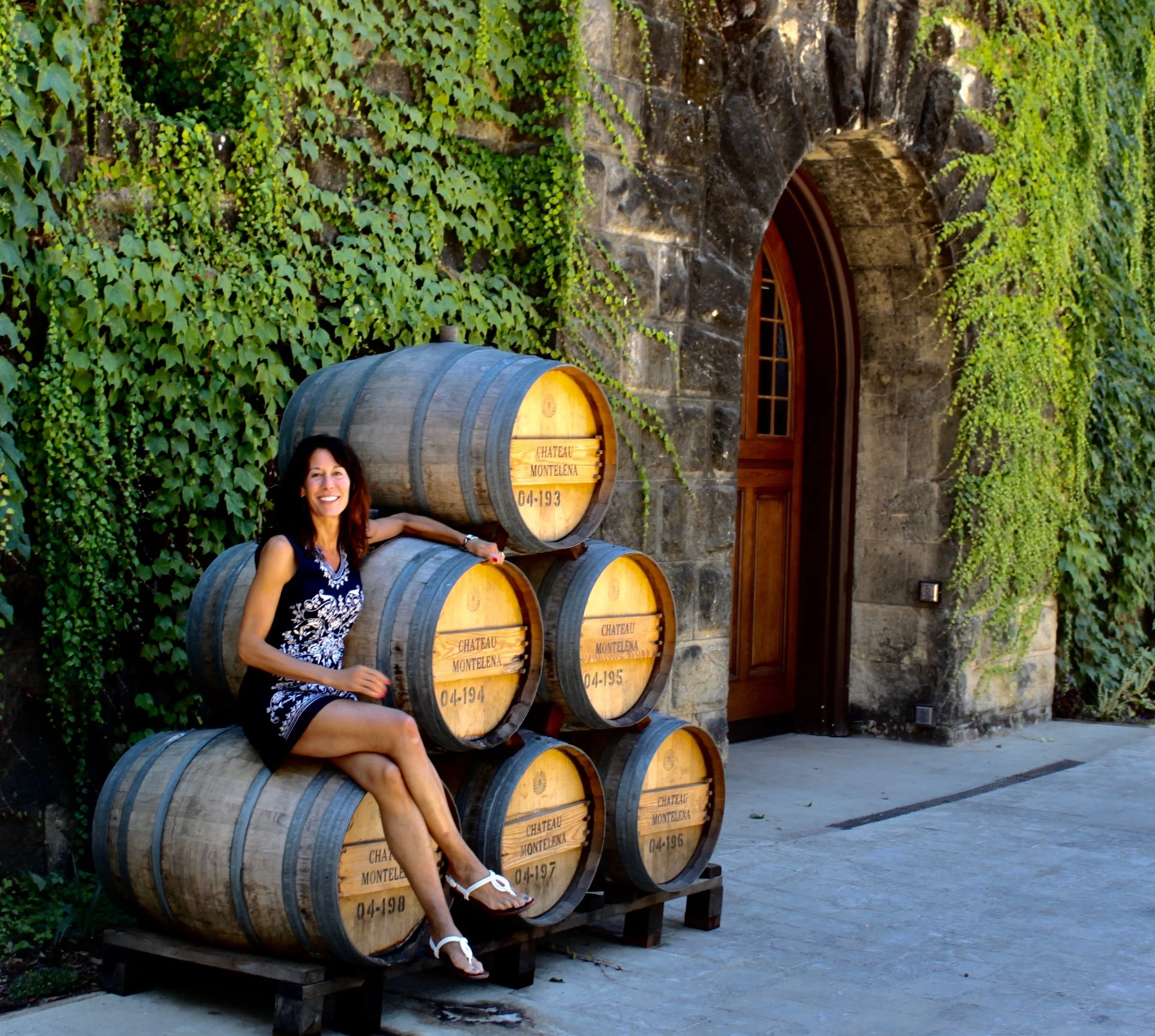 In front of the ivy-covered, stone castle at Chateau Montelena.
