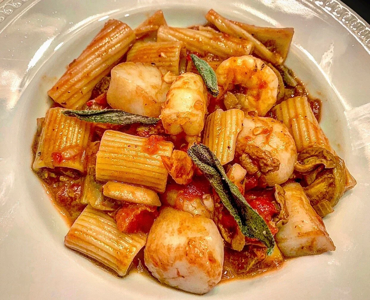 Pasta with Scallops and Shrimp in a Tomato Mushroom Sauce
