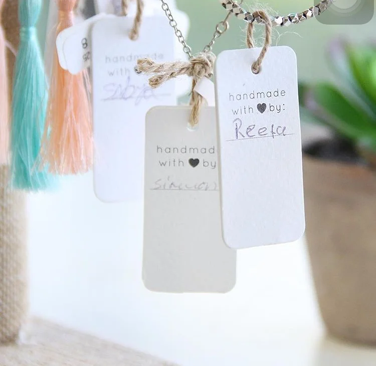 Each jewelry tag is hand-signed by the girl who created it. 