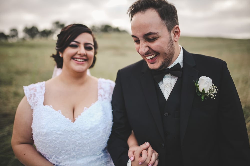 When planning our wedding, we agreed that photography was one of the few aspects of the wedding that was very important to us as this is the aspect that lasts a lifetime (other than our marriage, of course). We are a couple that enjoys sentiment and the joy of a moment, so choosing a photographer like Kiara was the perfect decision. Kiara is a photographer that captures precious moments, rather than manufacture them. We love our wedding photos because we can link each photo with the emotion, thought, memory and the purpose of the day as many of the photos are candid shots that perfectly reflect us as a couple. As a photographer, Kiara is very easy going. She not only ensured that the bridal party felt as comfortable as possible, but that we all had a good time during our shoot. She can turn a simple area into the perfect place that would match our attire, our wedding theme and our relationship. Kiara is incredibly skilled at what she does, and we would recommend her for any occasion. - ANDRIA AND SILVANO, MAY 2015