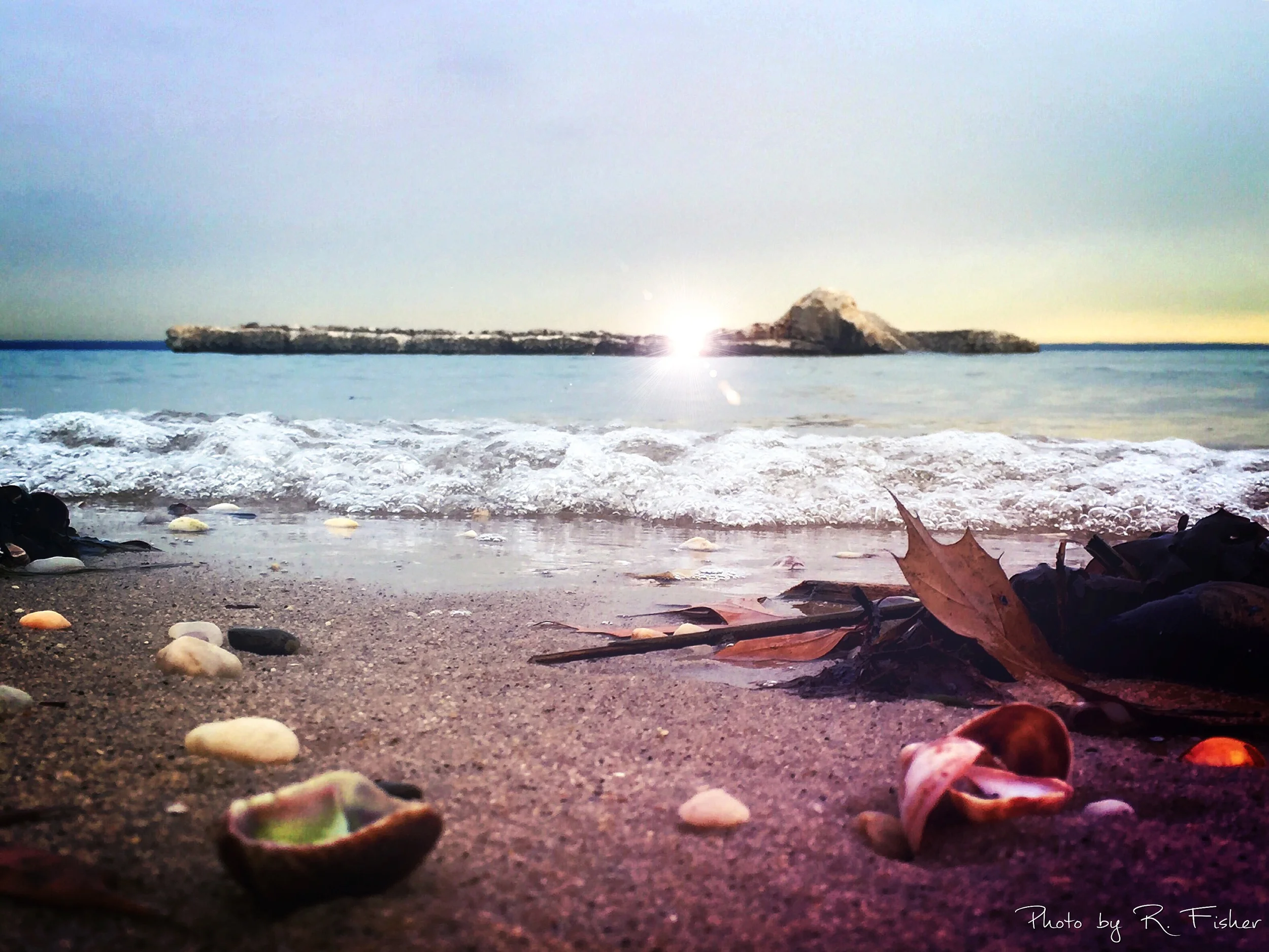 "The Sunrise rainbow-hearted steals athwart the misty brine"