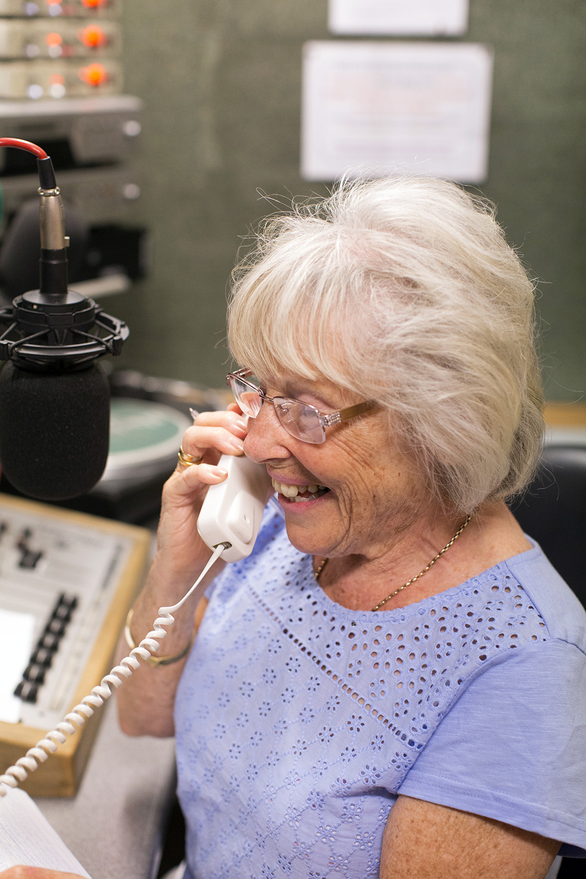   Host Eileen Trodd talking to a listener during her Tea for Two program  