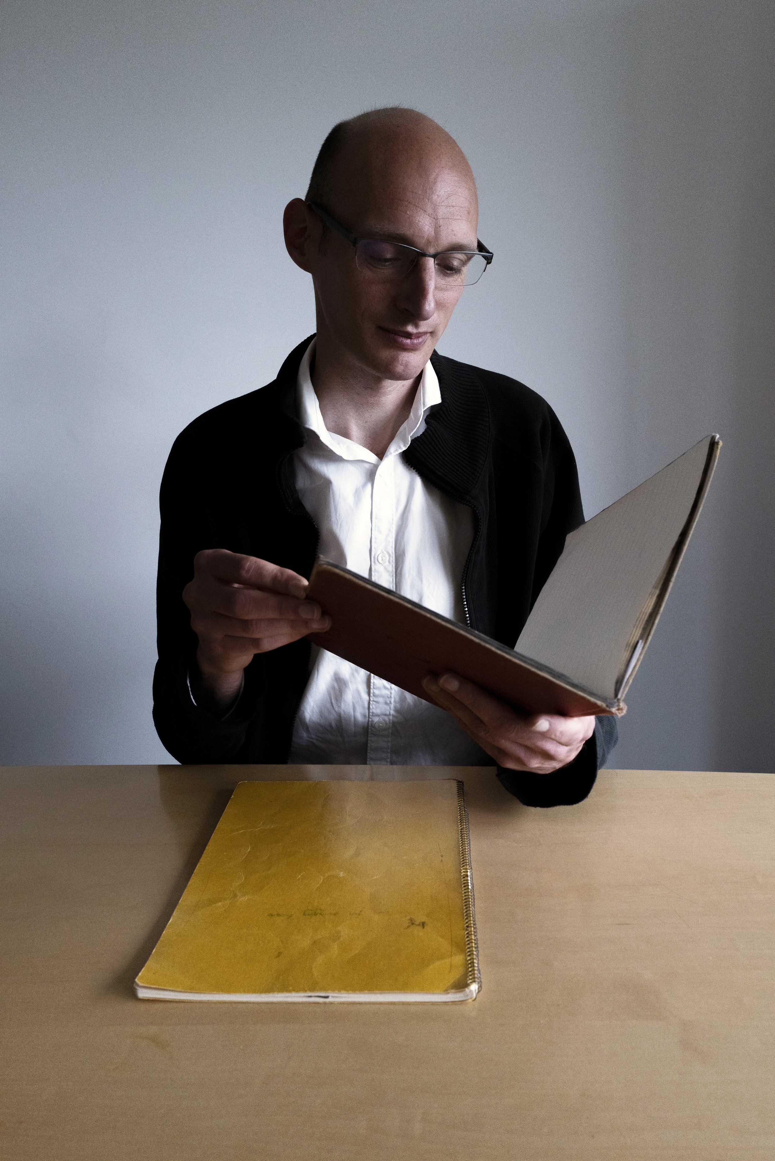   Dr Gabriel Heaton, a books and manuscripts specialist at Sotheby’s. with the late Freddie Mercury’s notebooks.   