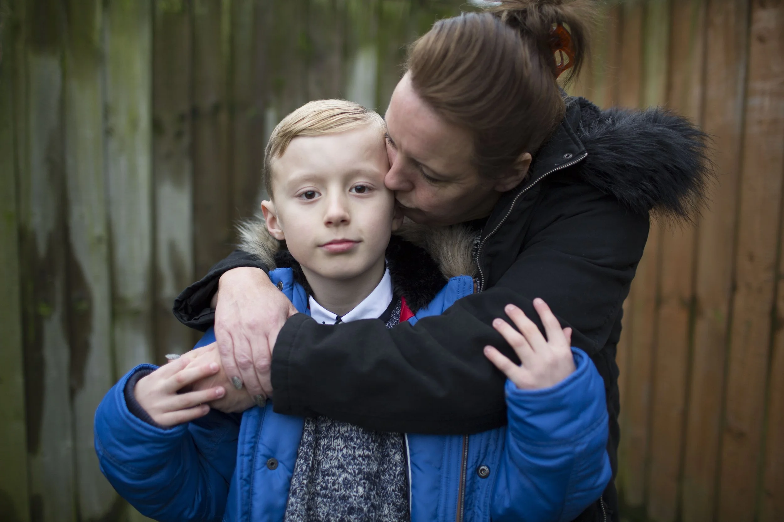 Sean, age 9, with his mom in connection with the Twin Vision Project for Comic Relief. Sean had recently lost his father, and creating a film with the charity helped him to cope and express some of that loss.