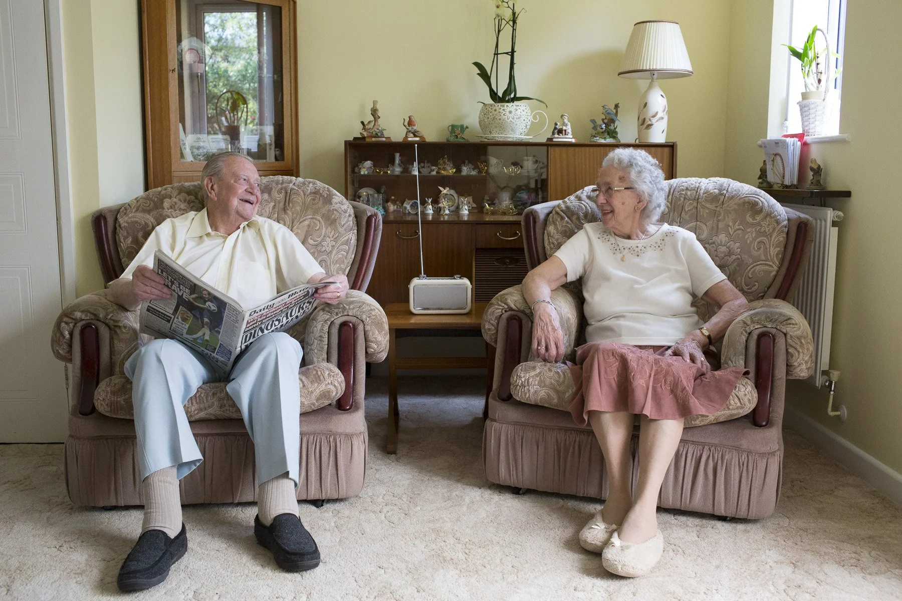 Devoted Angel Radio listeners Ron and Nora Port at home with their radio