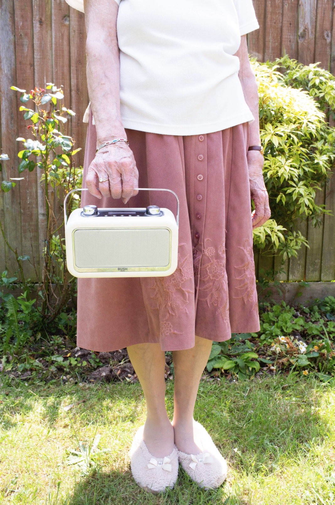 Devoted Angel Radio listener with her radio
