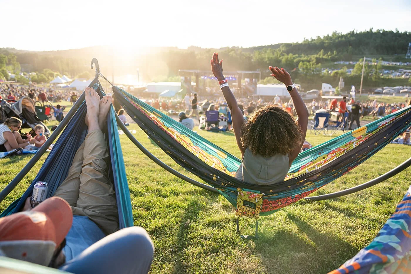  Festival goers jam out while sitting in hammocks at Whizzbangers Ball in Glen Jean, WV, in June 2024.  