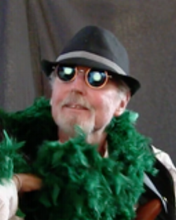Brian doing Leonard Cohen, plus boa.