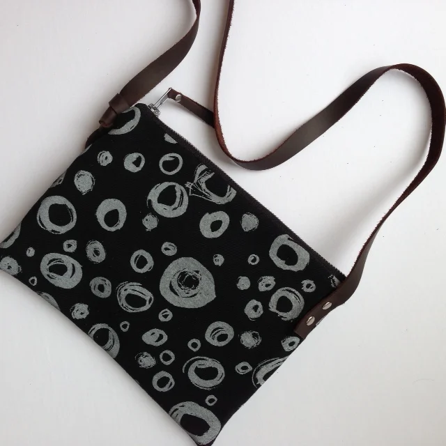 'The Fly' day bag in my Circles print, silk screened on Cotton Twill, with a leather strap.