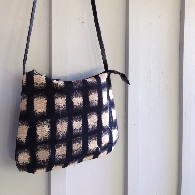 "Doris, the Day Bag' in a hand painted discharge on Cotton Twill, with leather strap.