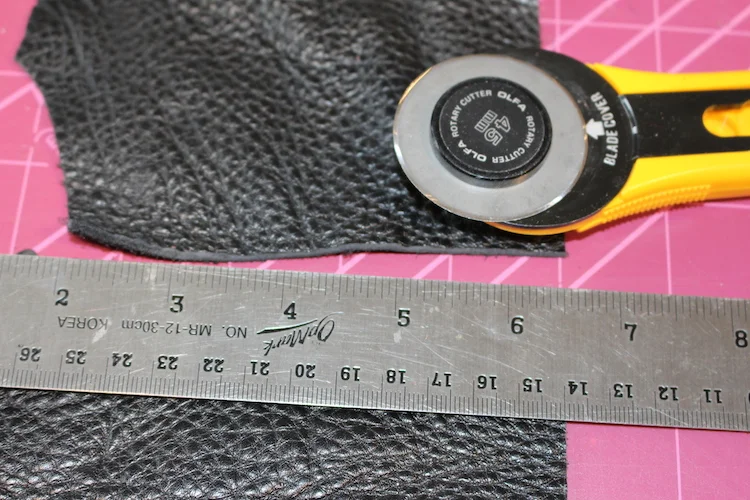 A lovely black, pebbled leather, with a bit of stretch. Not sure this is a good idea.
