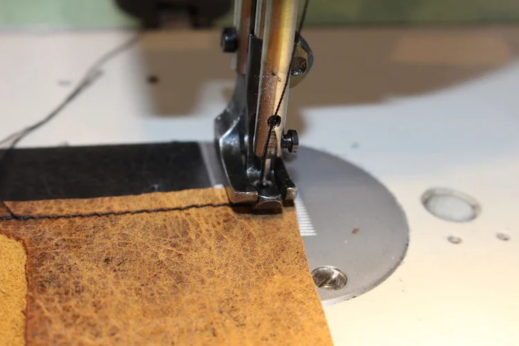 Leave the needle down to pivot at the corners.