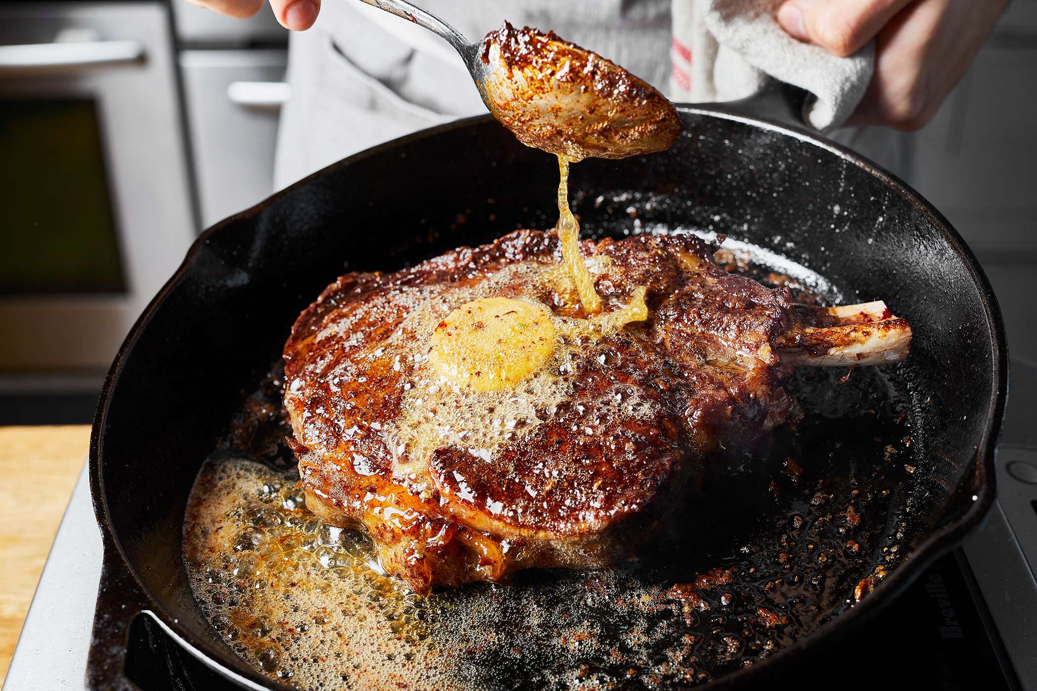 tasting-table-compound-butter-steak-cast-iron.jpg