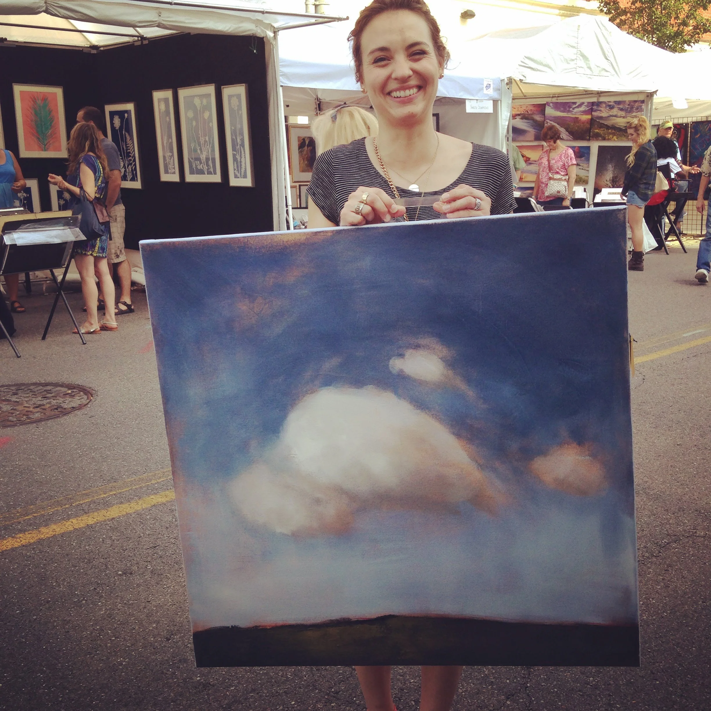 Delighted new Blue Sky Owner, Eliza, from the 58th Annual Taubman Museum of Art Sidewalk Art Show, June 2015