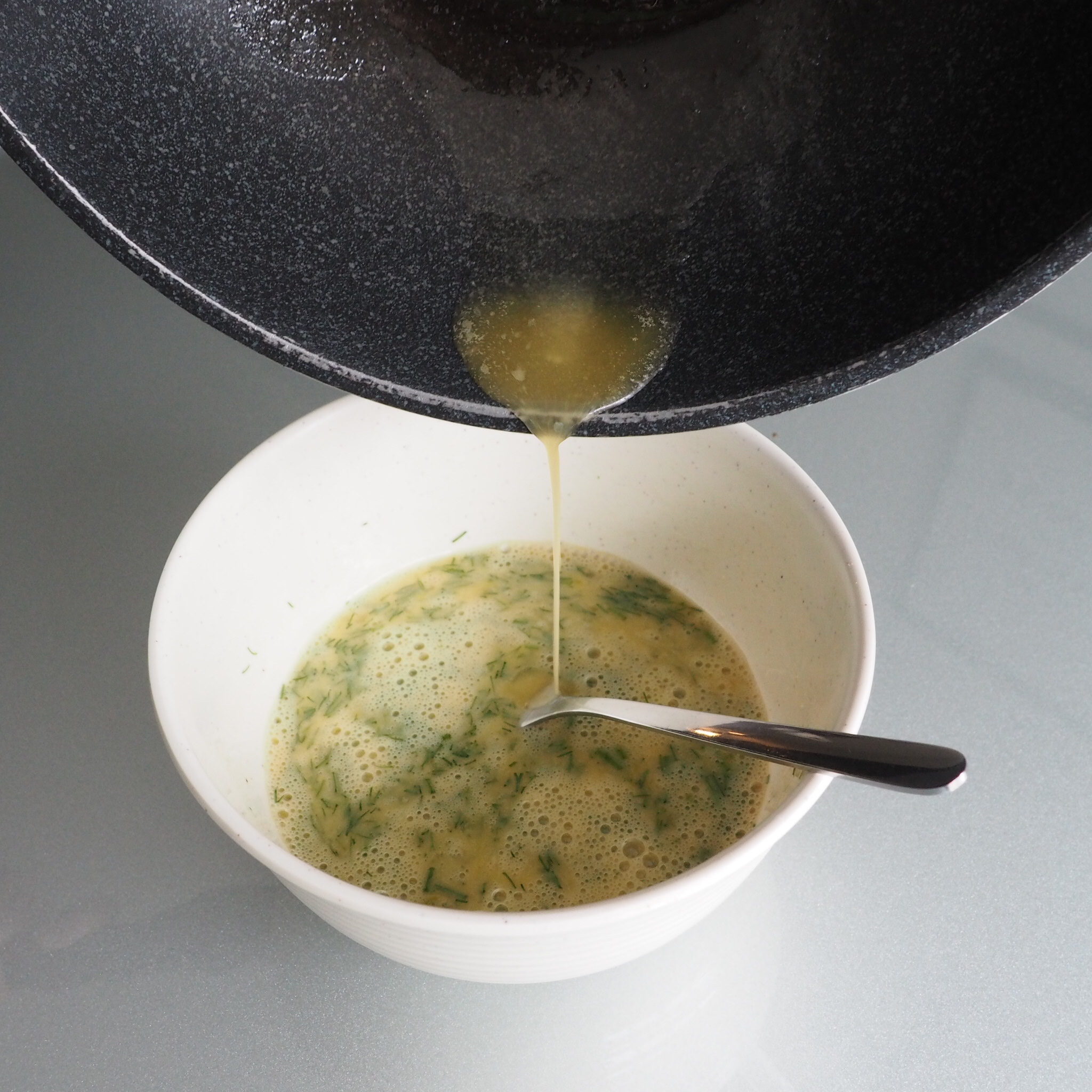  Step 2: Add in 1 tsp of melted vegan butter or oil into your scrambled eggs 