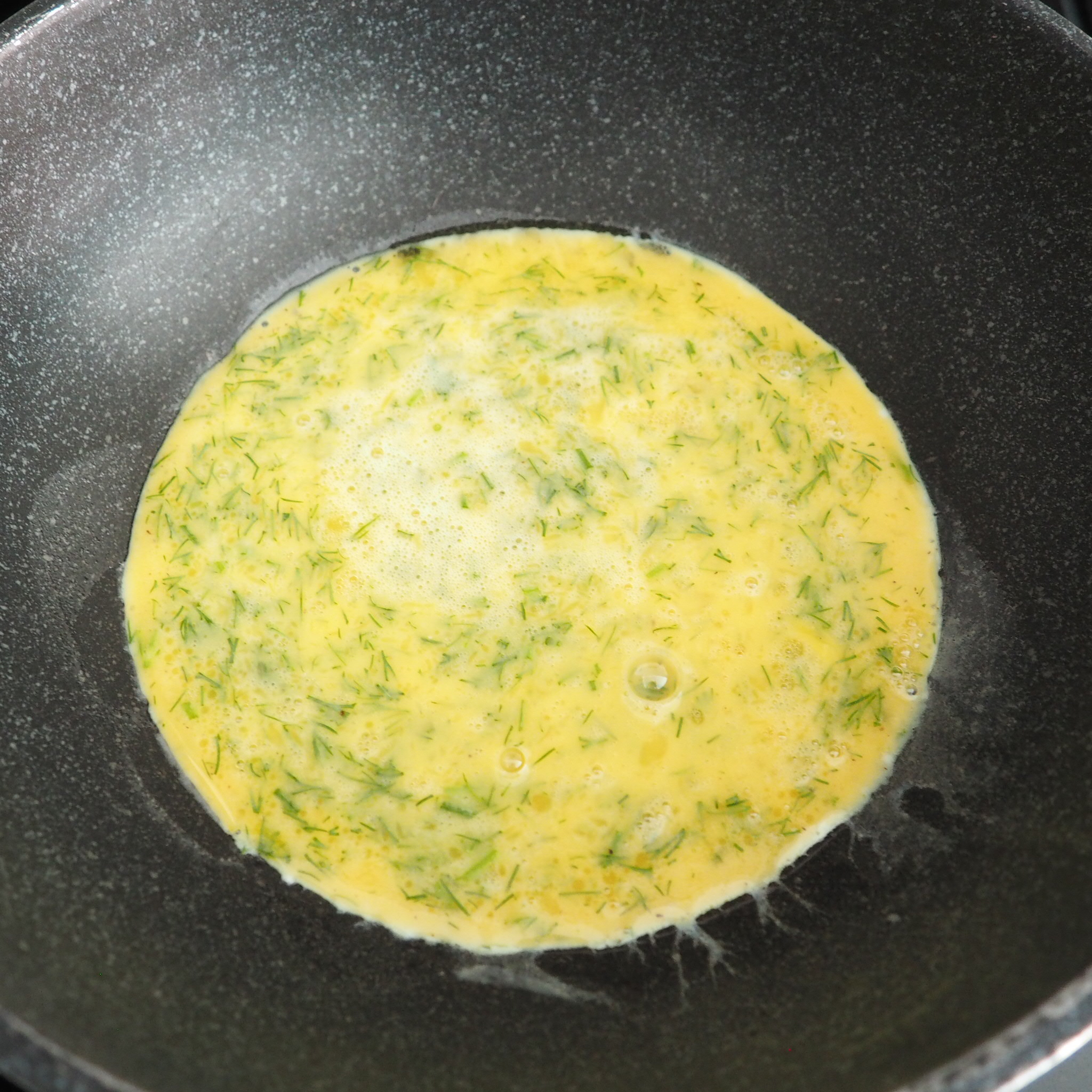  Step 3: On a pan set on medium heat, pour in your scrambled eggs 