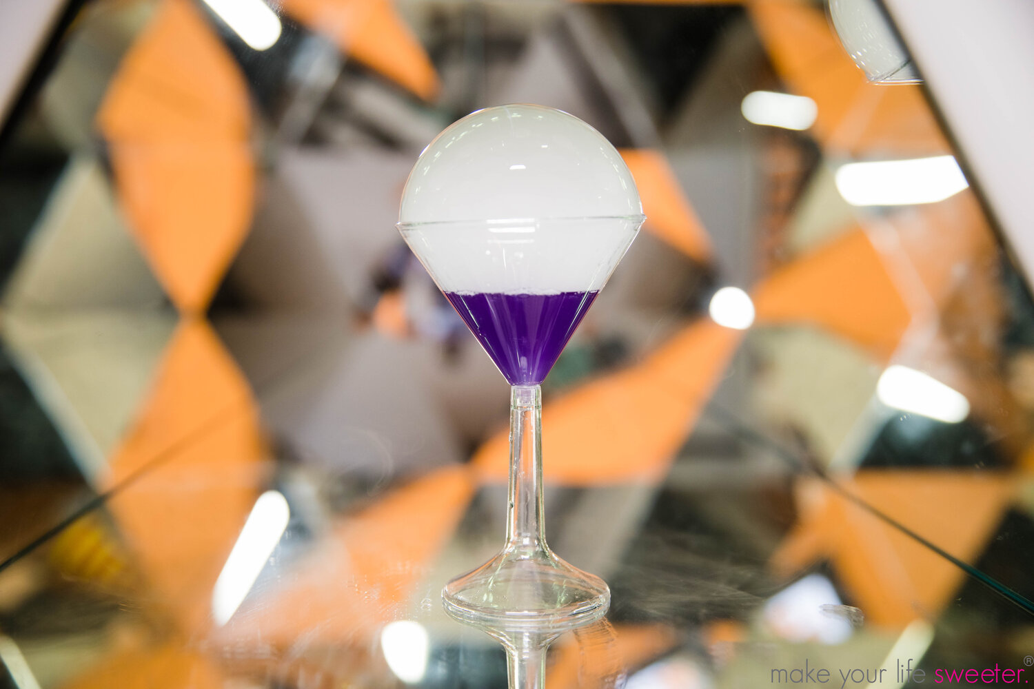 The flavored edible vapor bubble looks amazing with our signature lychee martini