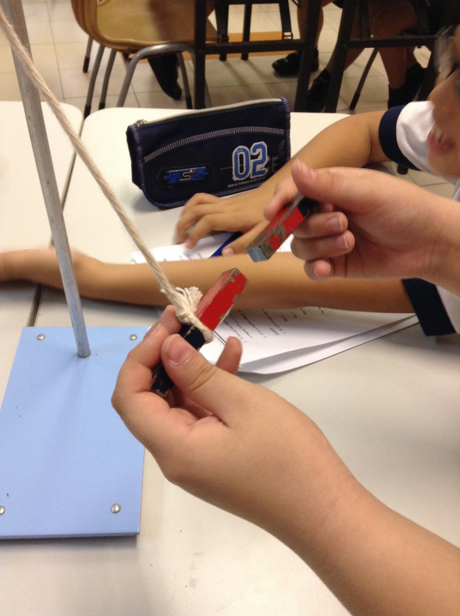 Fig 1. Students conducting the experiment.