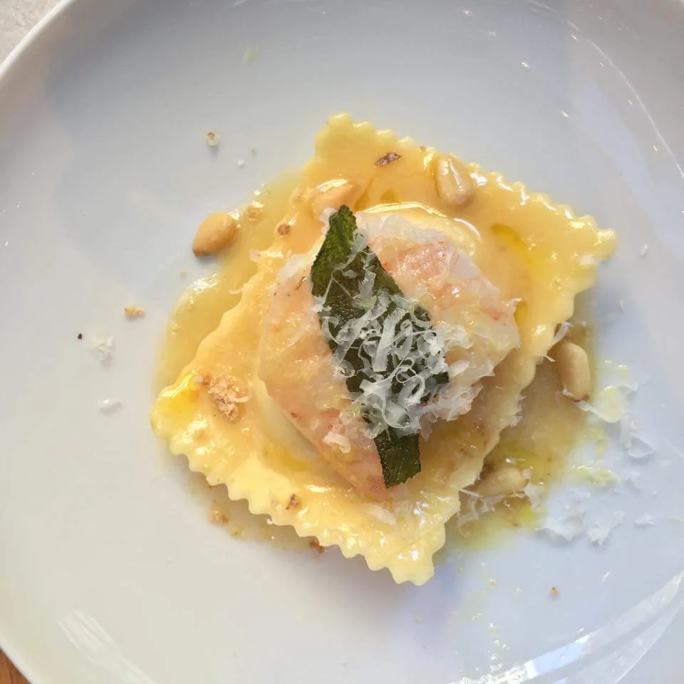 Ravioli + Prawn Trio - butternut squash and mascaropone ravioli, truffle butter sauce, sauteed jumbo prawns, pine nuts. Cost - $14.50.