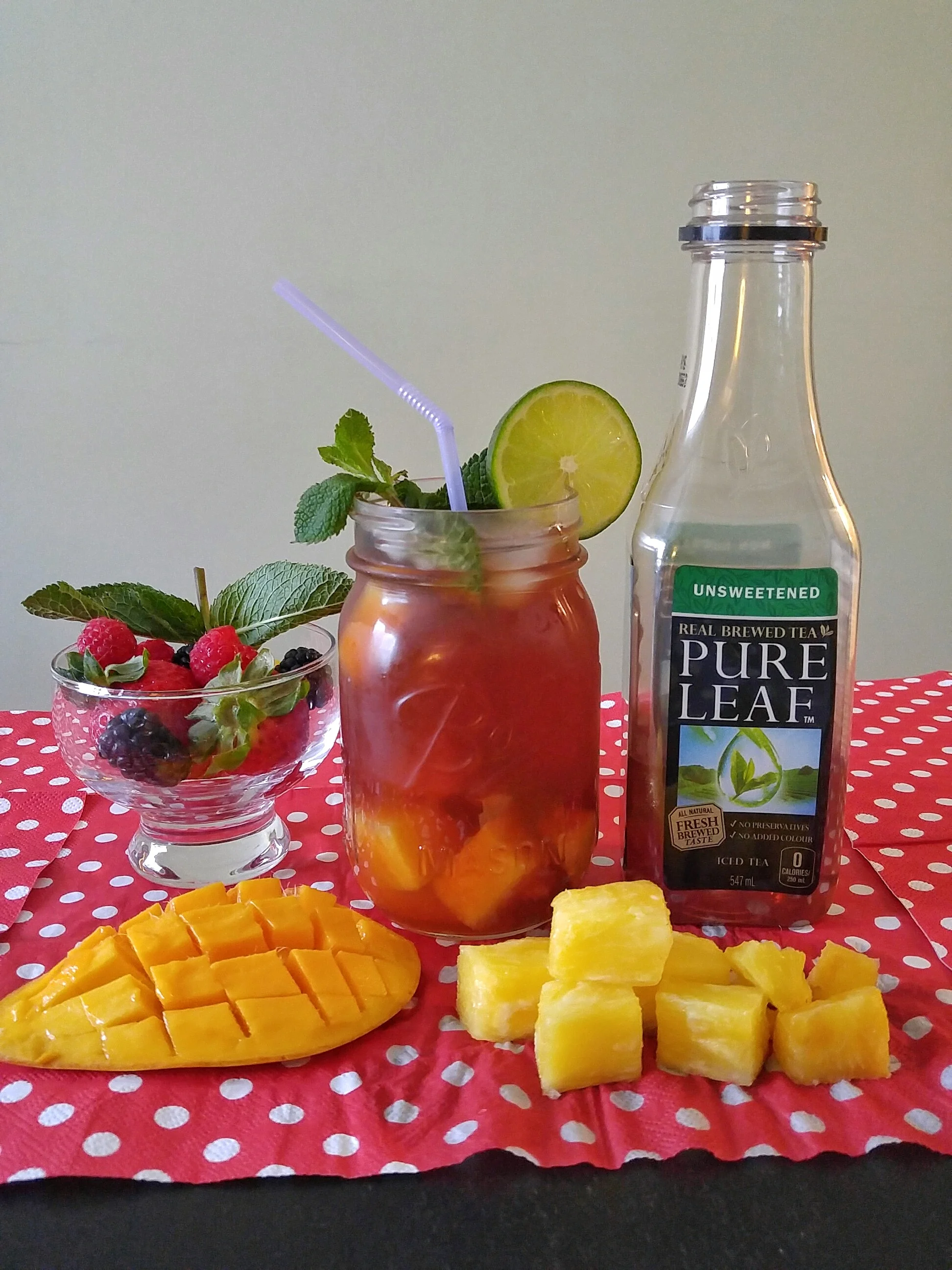 Mangoes + Pineapples mixed with Unsweetened Pure Leaf Black Tea