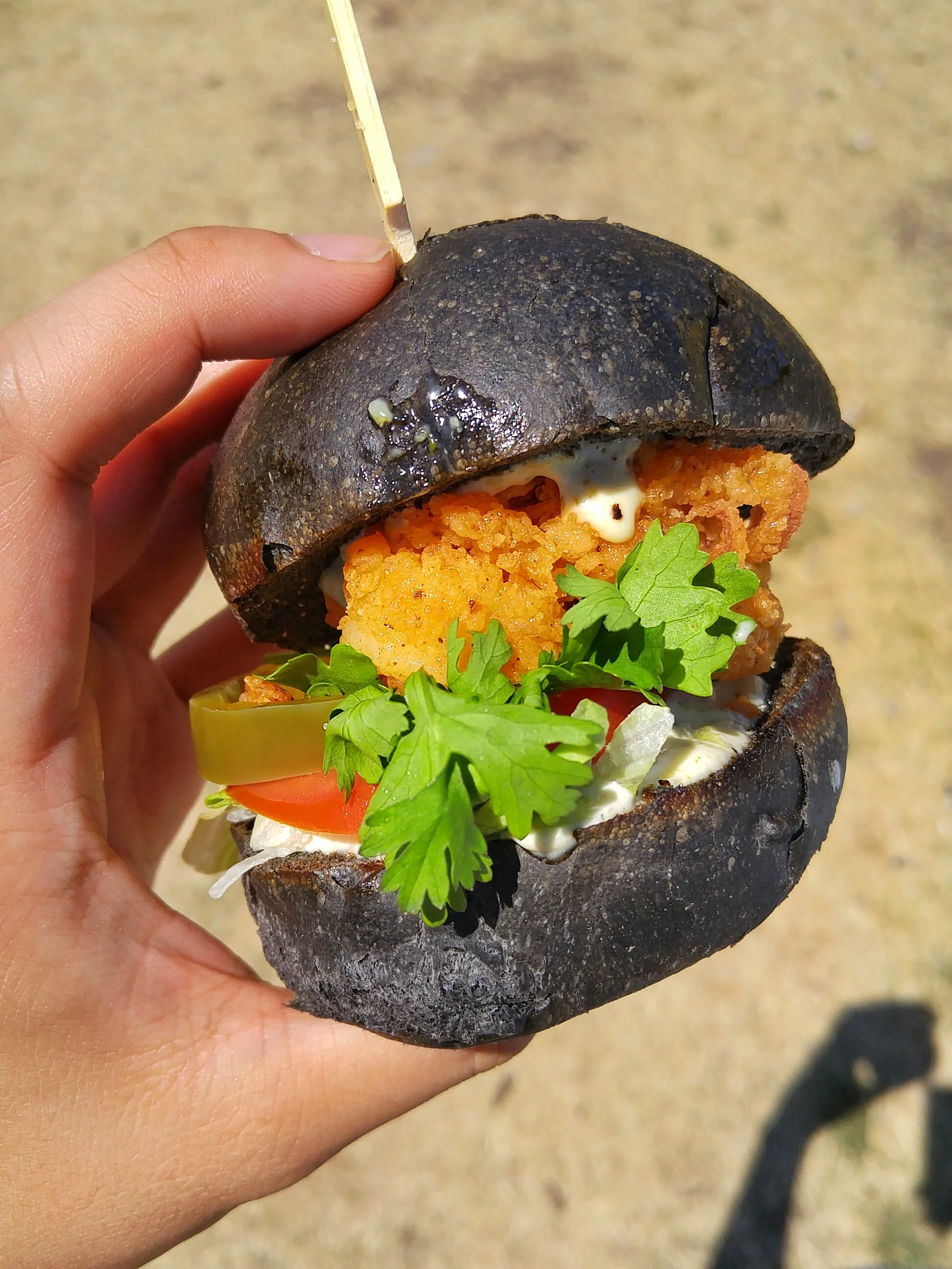 Crispy Calamari Po-Boy - with Ace Bakery charcoal bun, lemon caper aioli. Cost - 8 Crowns