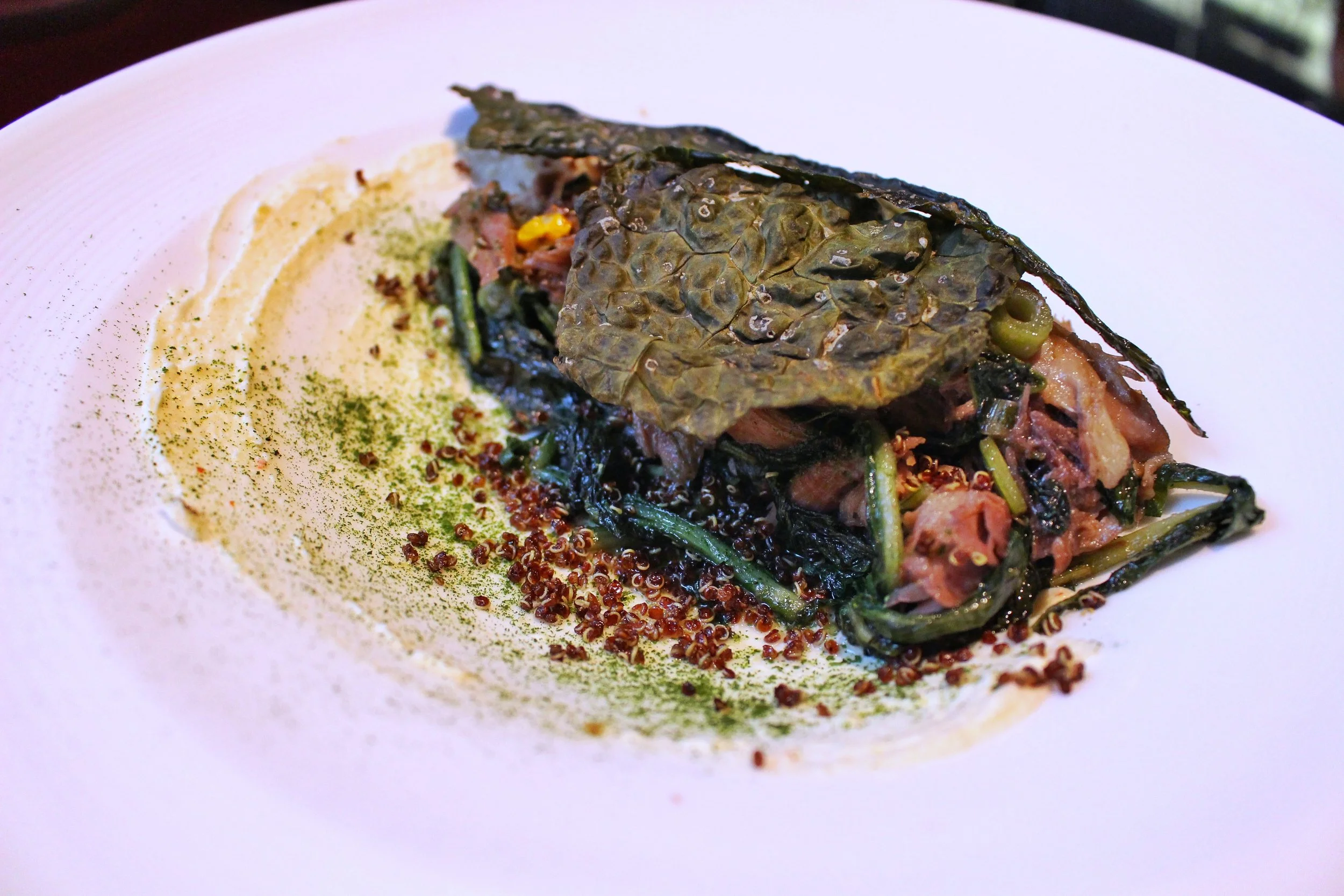 Duck Confit - dandelion greens, whipped ricotta, puffed quinoa, sea buckthorn, elderflower vinaigrette