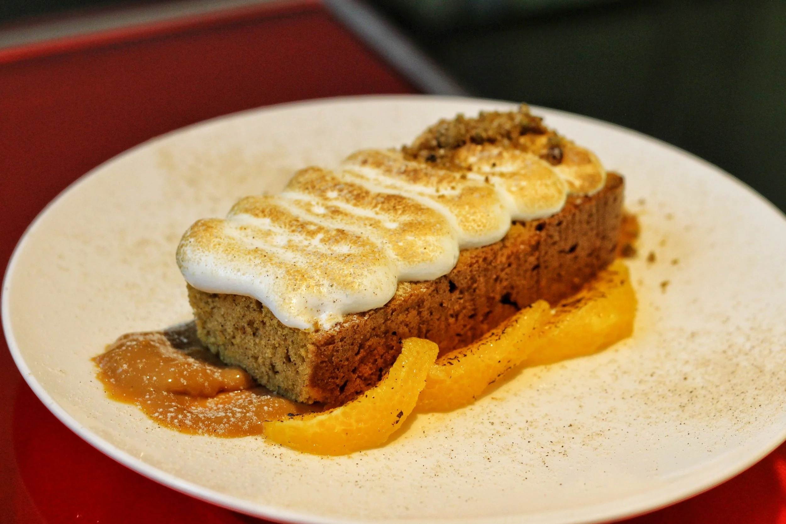 Ontario Wild Rye & Sweet Potato Cake - burnt citrus, toasted birch syrup meringue, goat milk caramel, graham cracker dust Bonus Dessert (Not on the Georgia O'Keeffe prix-fixe menu, but on the regular menu)